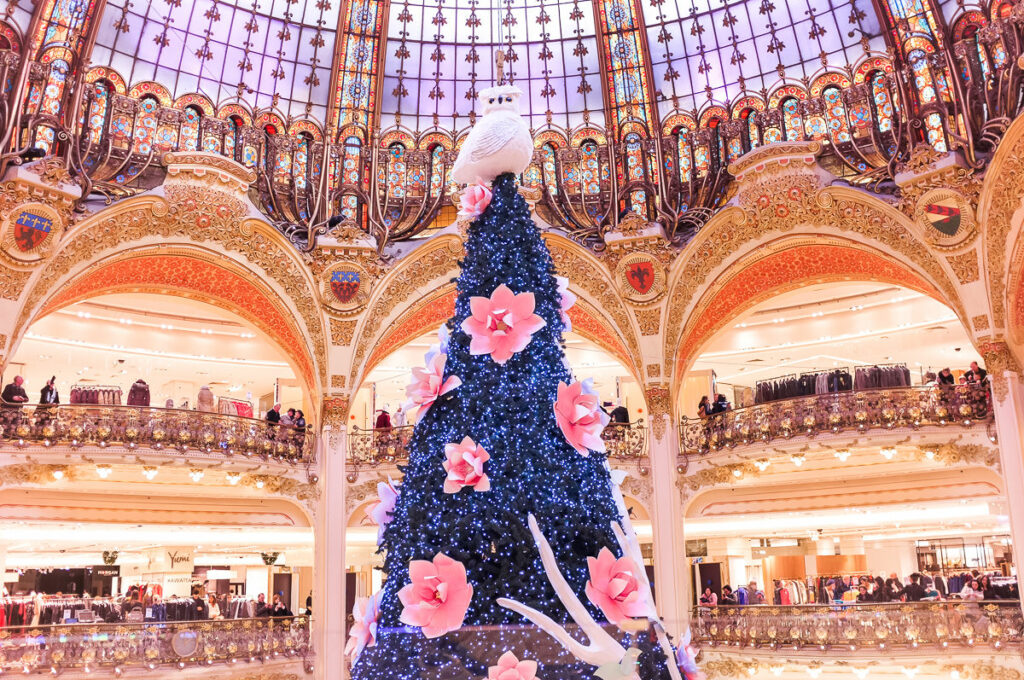 Christmas tree and decorations inside Galeries Lafayette in Paris